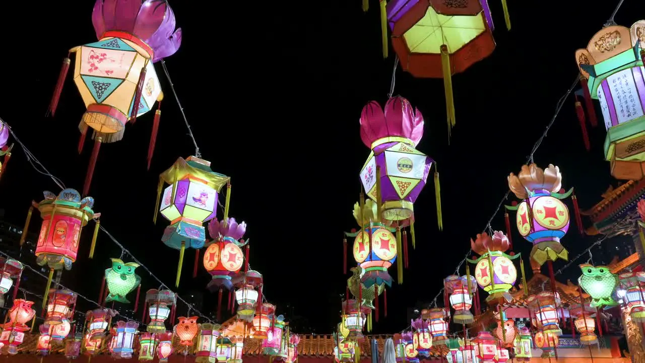 Numerous colorful lanterns which symbolize prosperity and good fortune hanging from ceiling wires during the Mid-Autumn Festival also called Mooncake Festival