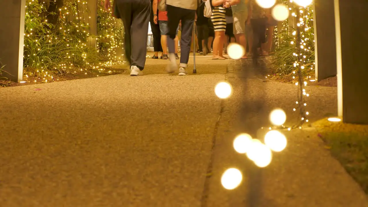 low angle of people walking during Christmas season