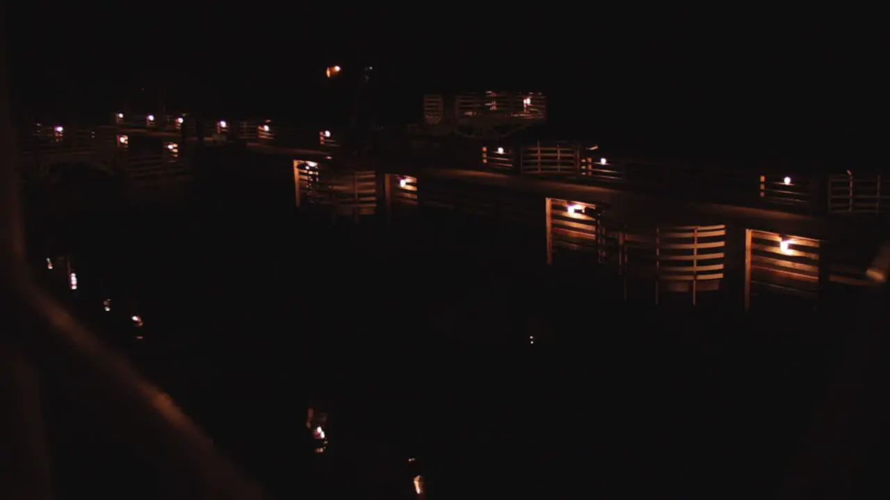 Slow motion Night shot of a dock filled with lights