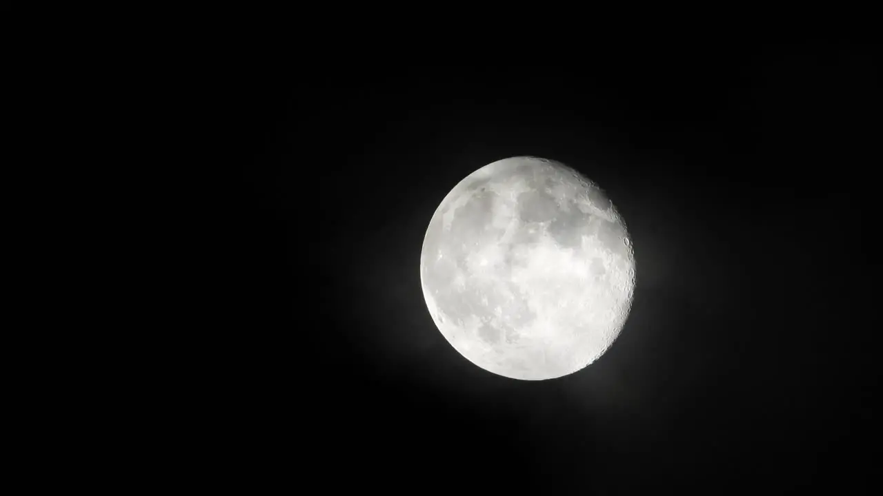 Clouds Rolling Over Full Moon Fading It Out