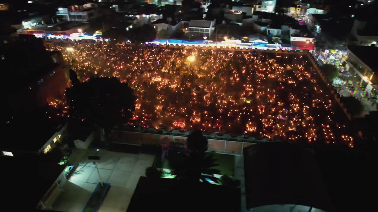 Flying over the Mixquic cemetery Day of the Dead candlelight like the movie Coco