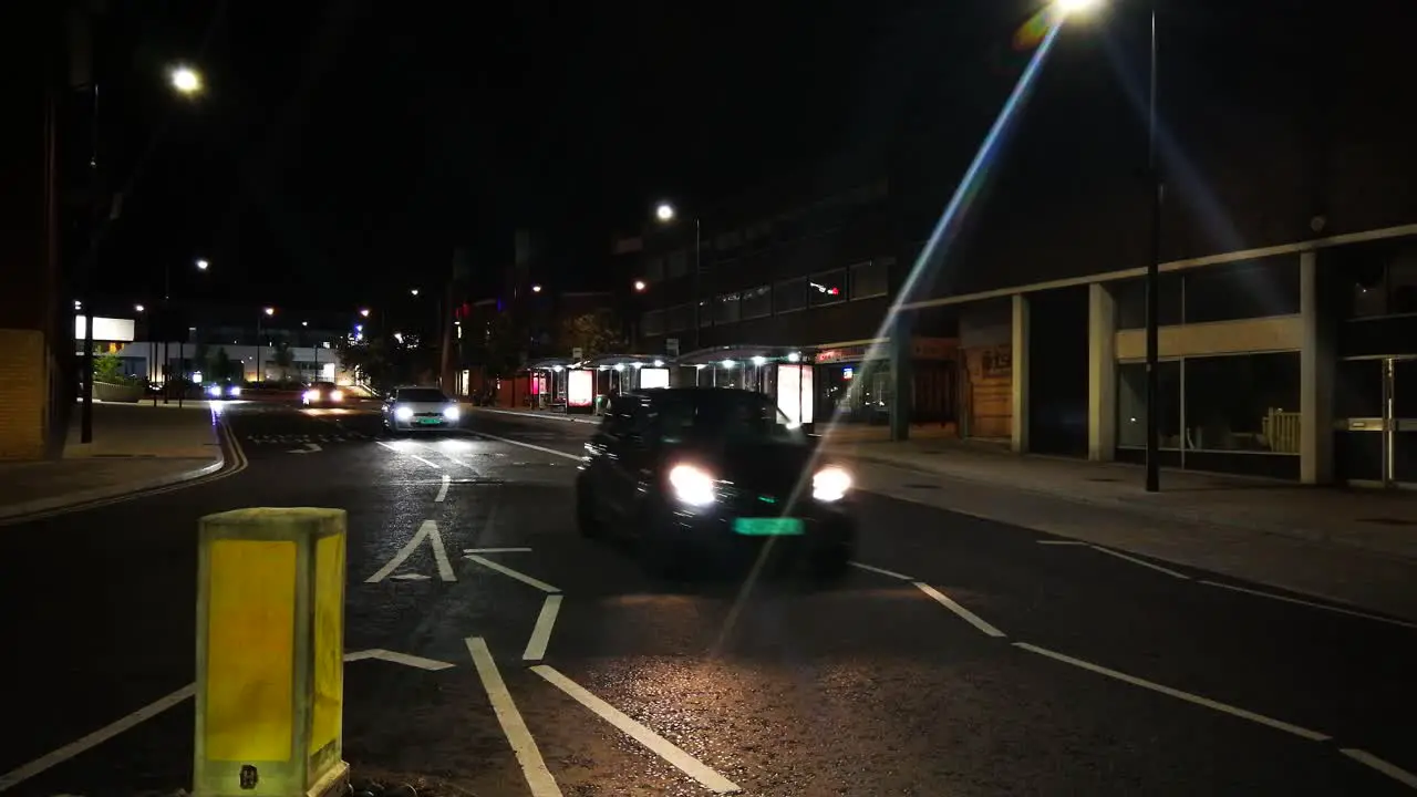 A night-time shot of traffic in Swindon town centre