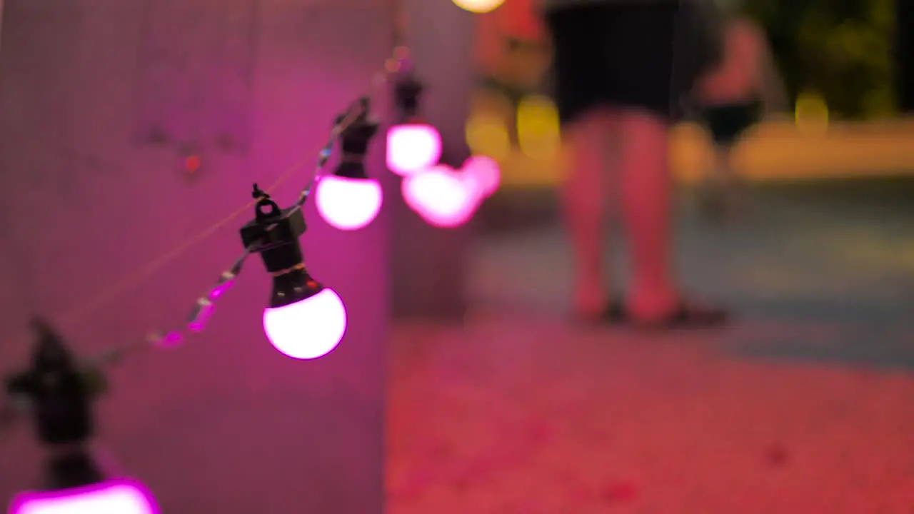 4k illuminated hanging light bulb during christmas season at southbank brisbane