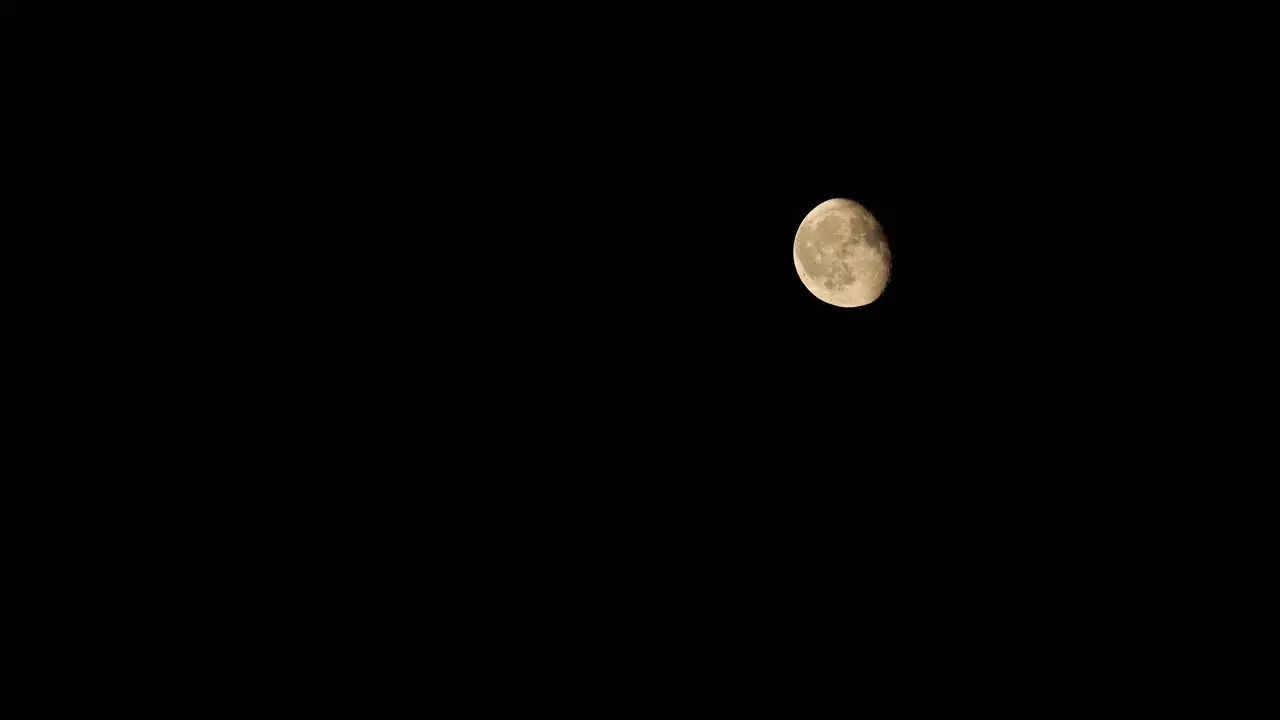 Full moon in dark sky at night