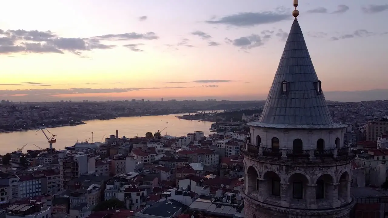 Aerial passes by Galata Tower during Sunset