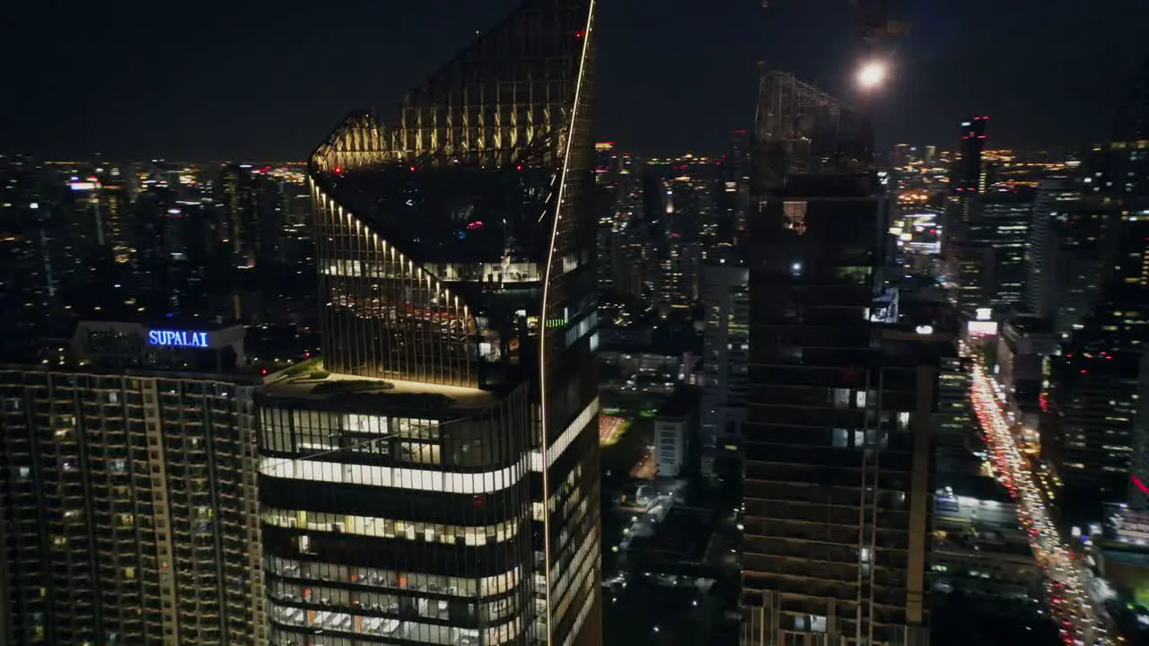 Flying Round Bangkok Skyscrapers at Night