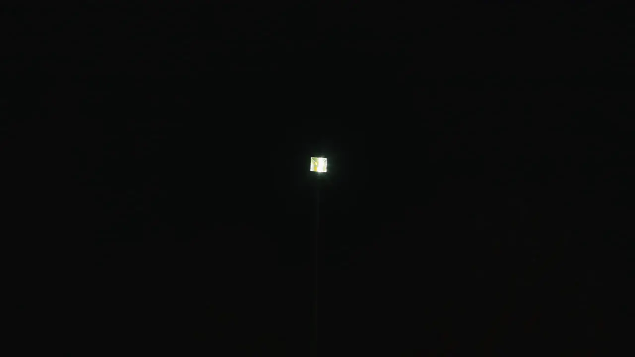 Blinking Streetlight in the Night