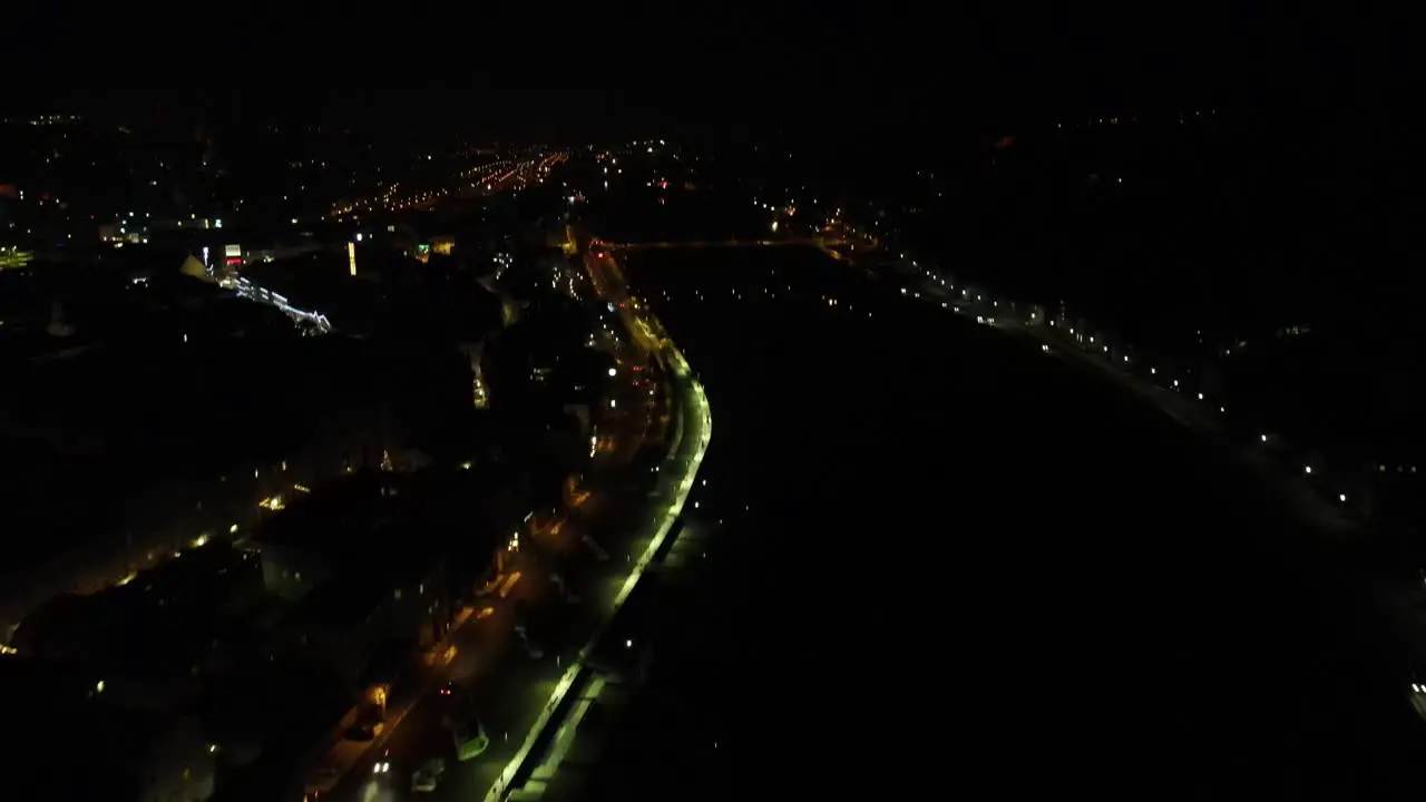 Nighttime traffic with city lights in Passau Germany