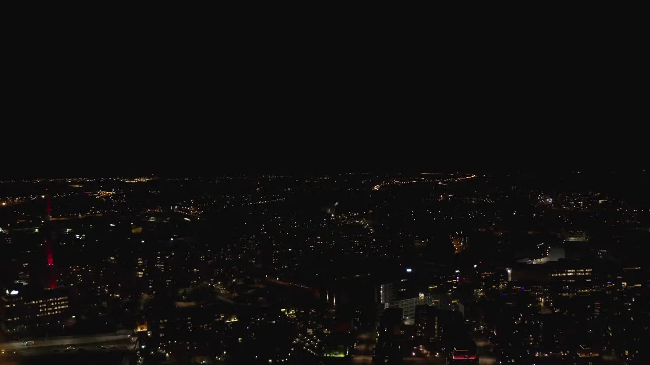 Aerial view of Illuminated city center at night