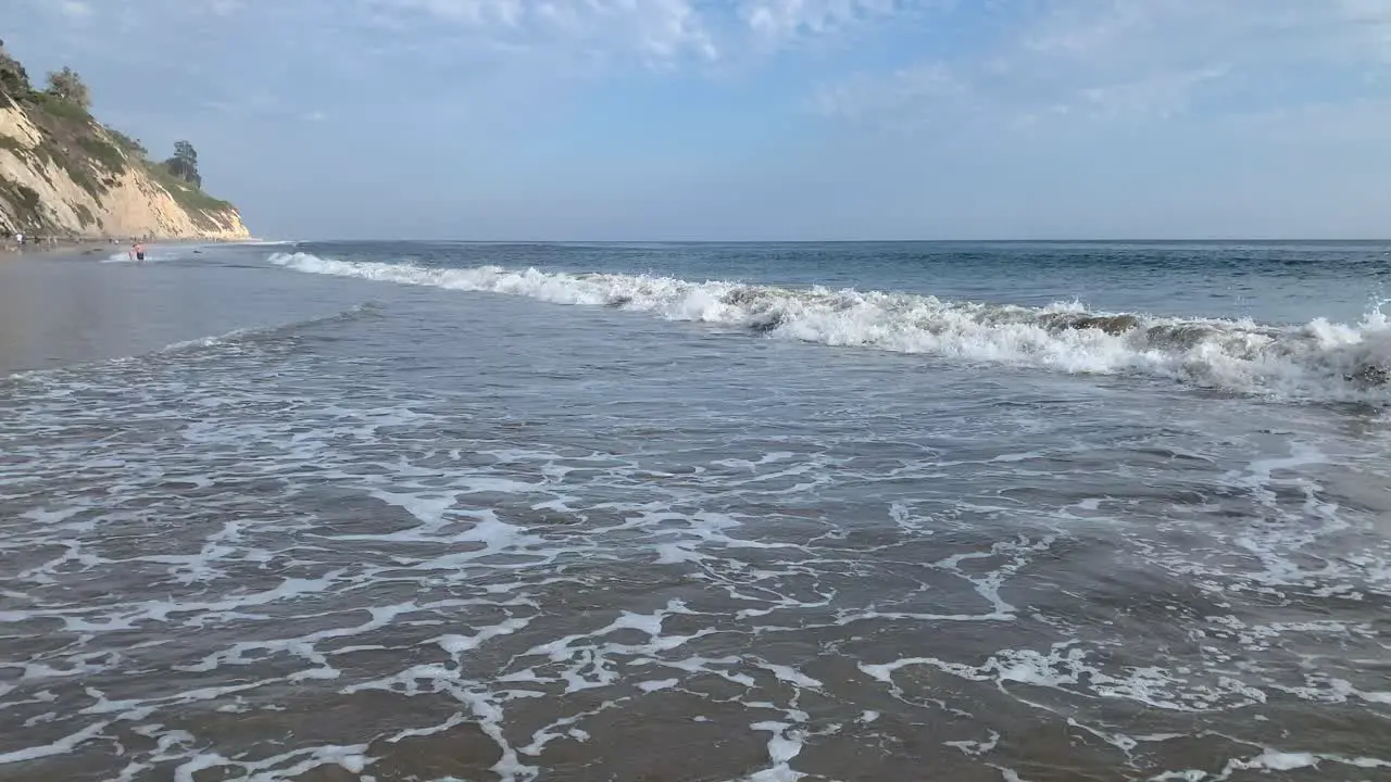 Waves Running against the shore at beach