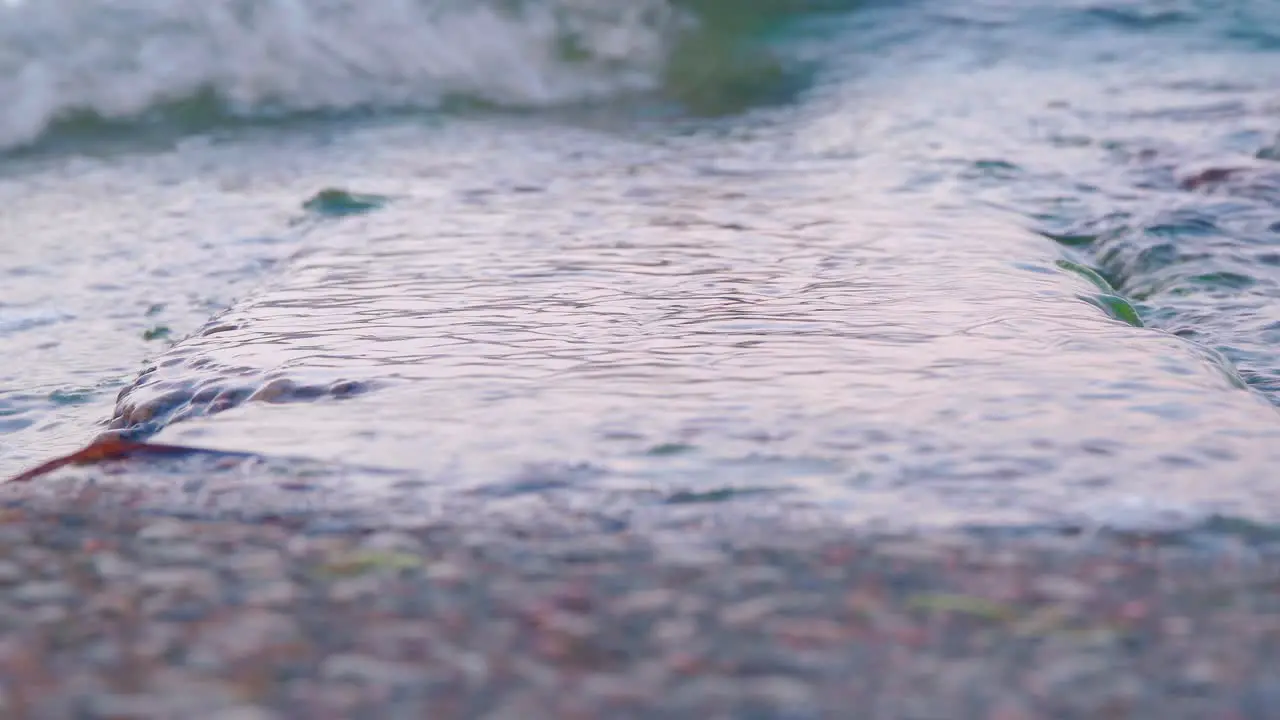 closeup of water flow on a rock