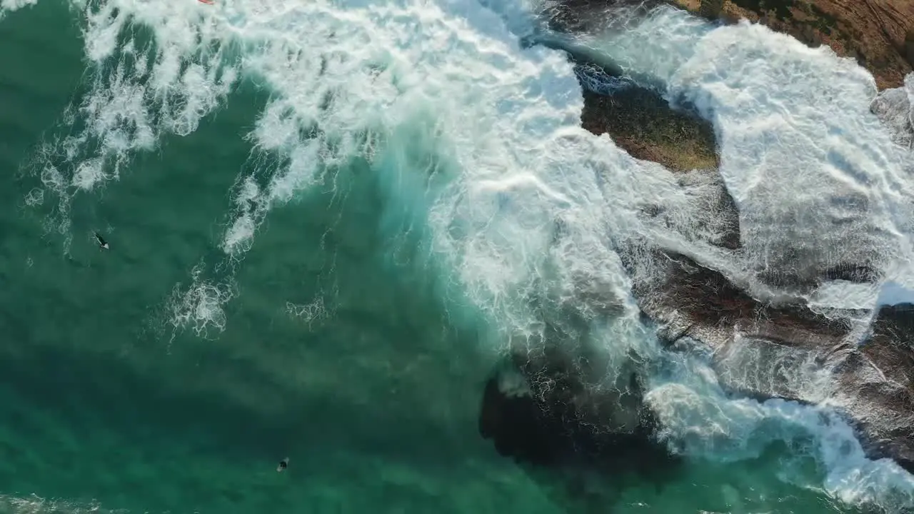 Waves breaking over rocks Sydney Australia