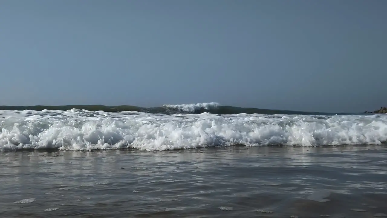 Slow motion shot of a wave rolling towards the camera