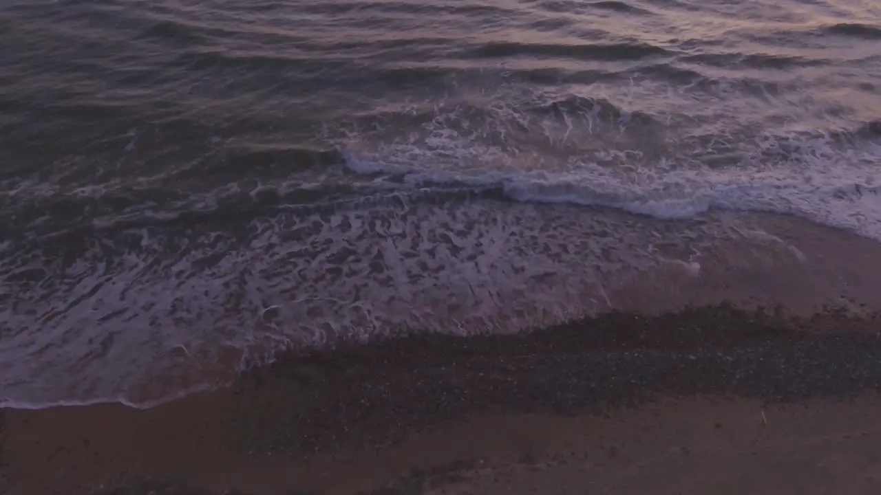 Sea Waves Rinse Seaside Beach At Sunset-1