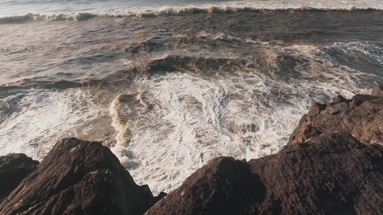 Waves crashing on rocky coast