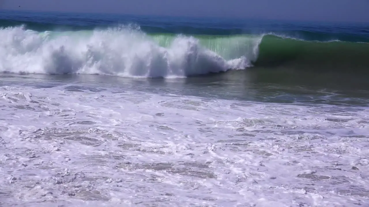 A large storm in Southern California causes a huge swell and crashing surf 1