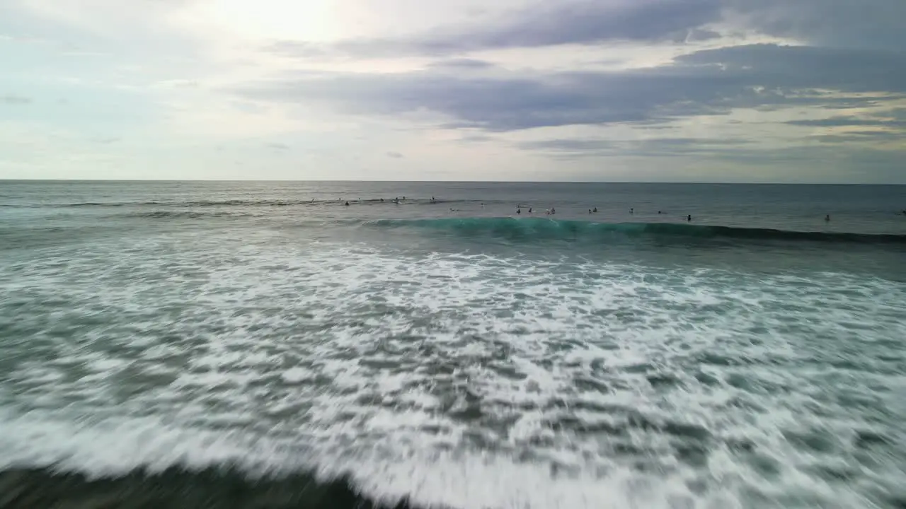 Ocean waves and surfer's in Bali Indonesia