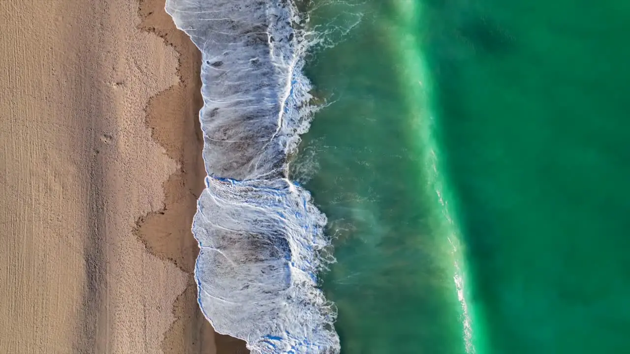 Beach Waves crashing on sand