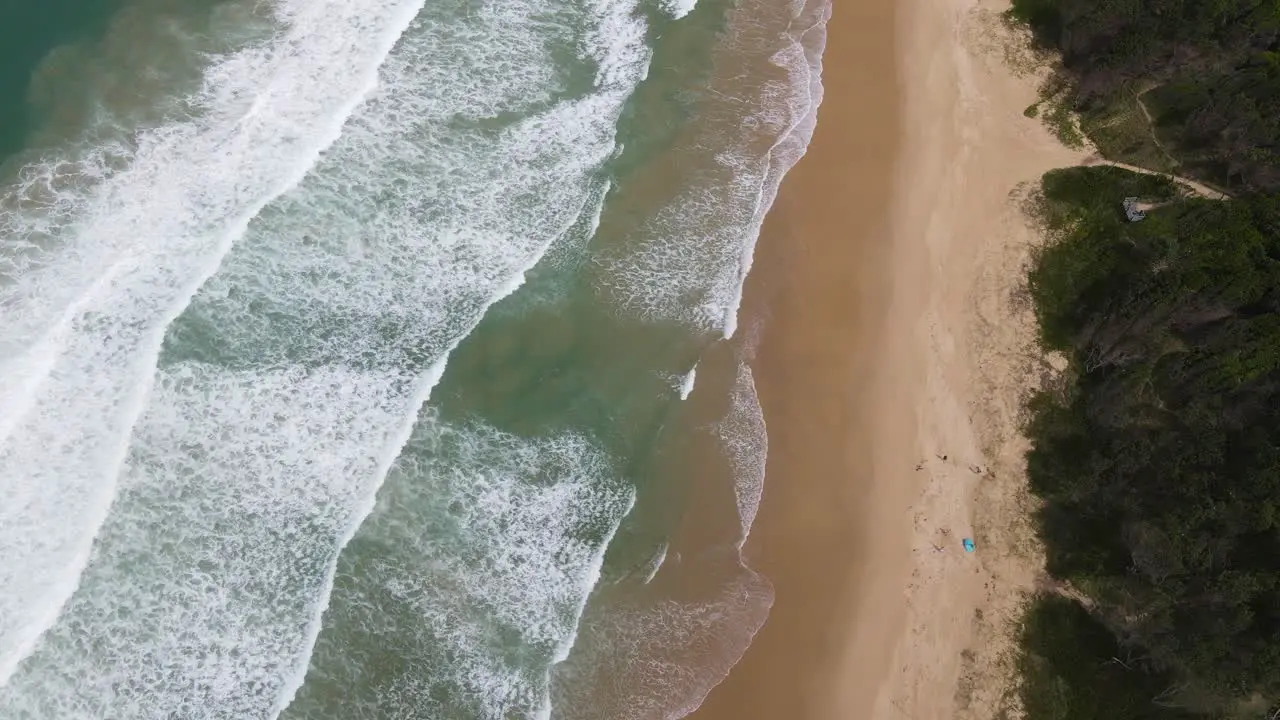 Summer Beach With Foamy Waves Onto Shoreline At Sawtell In New South Wales Australia