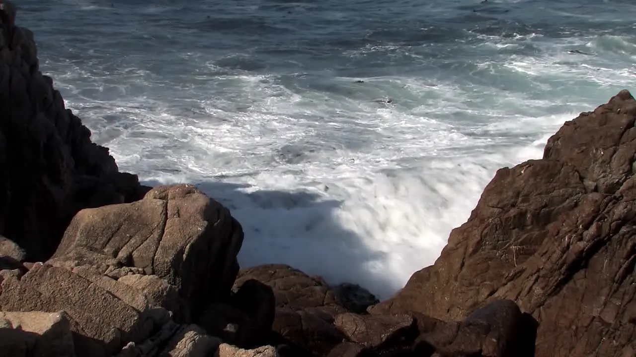 Waves of the Pacific Ocean hitting rocks near San Francisco California USA