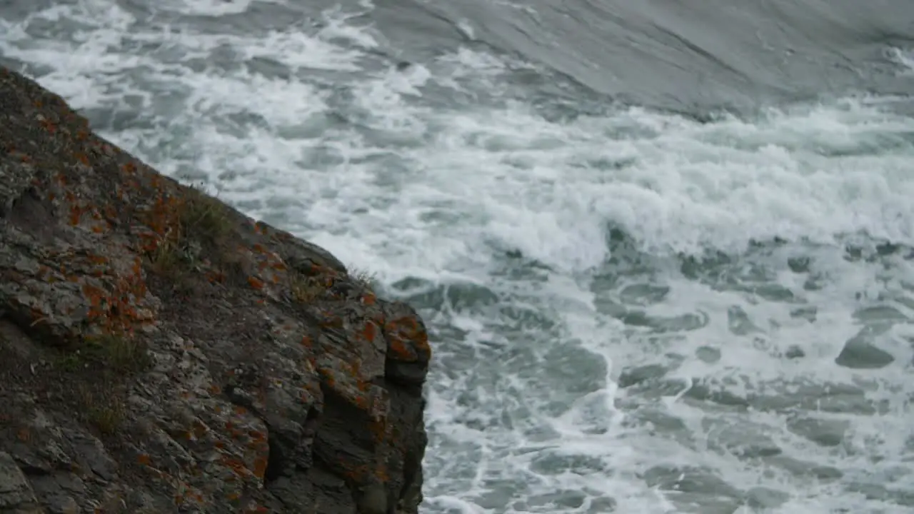 Beautiful waves coming in slow motion towards the camera man in shot from above