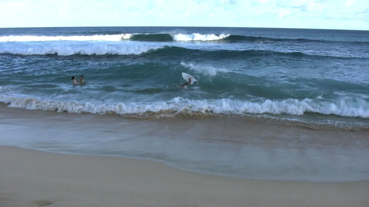 Oahu Sandy Beach Surfer Passes Waves