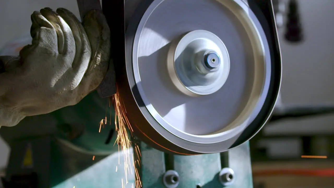 Worker Sanding Down Metal With Sparks Slow-Motion