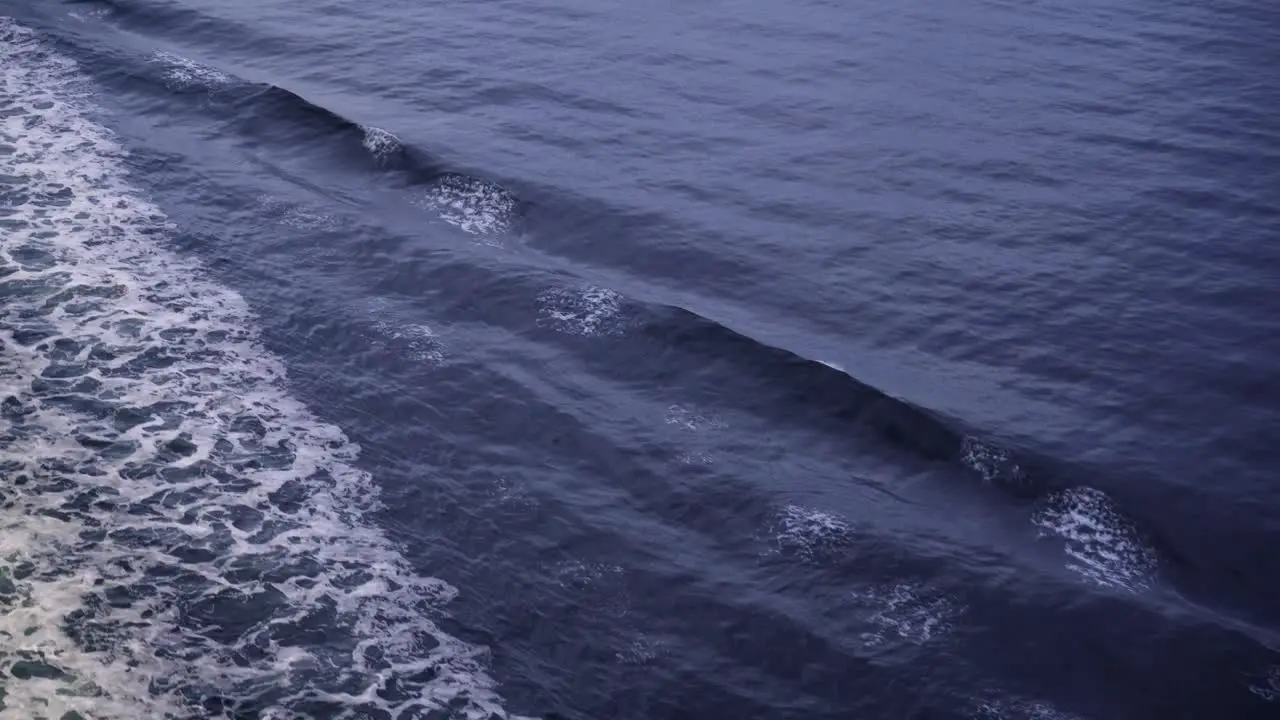 The wake from the rear of the cruise ship in the open ocean