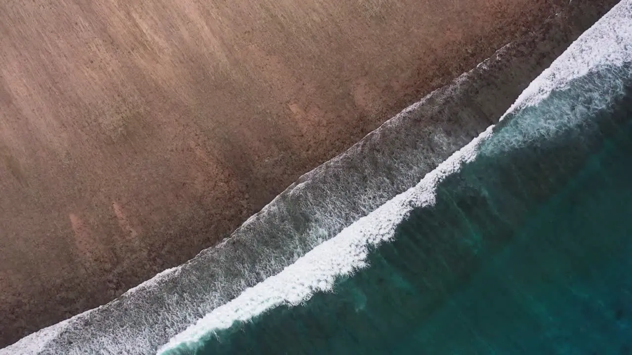 Aerial view of Gili Trawangan Island coastline Indonesia with sunset sunlight