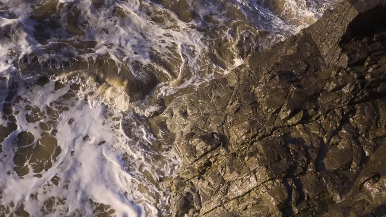 WESTON SUPER MARE SOMERSET UNITED KINGDOM Polluted water waves crushing on the old pier of Weston 