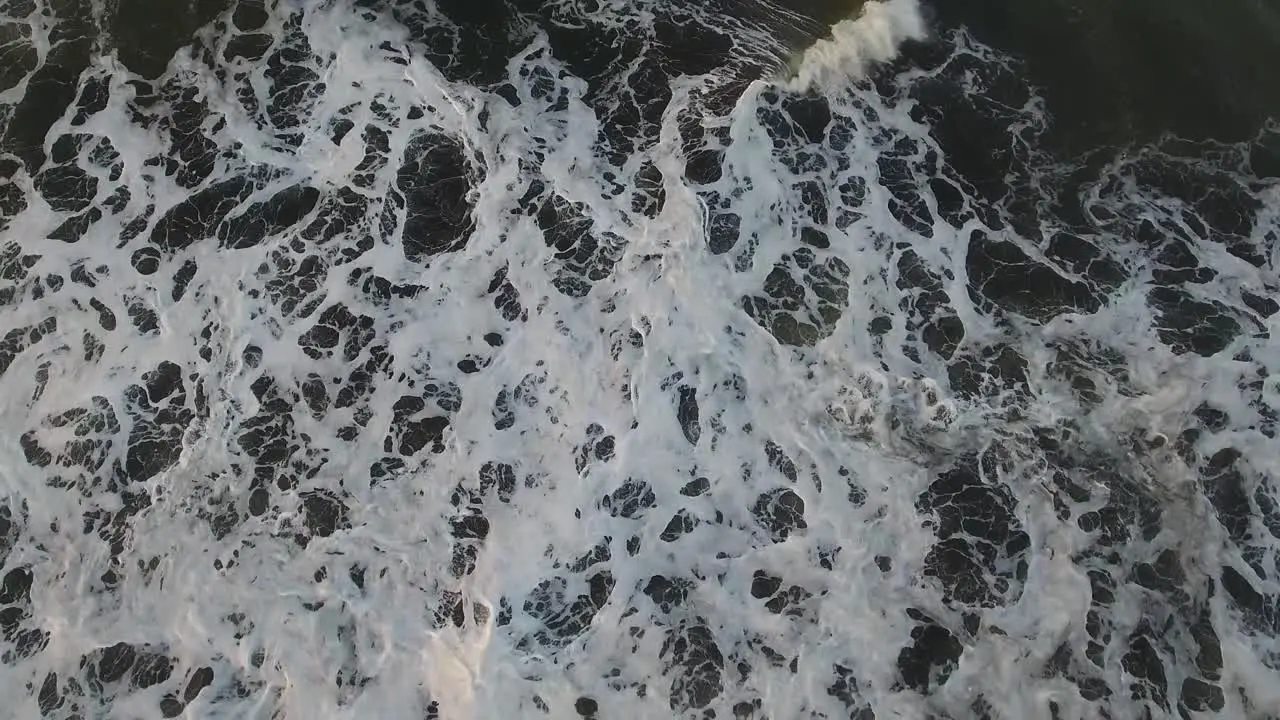 Beautiful aerial over a black sand beach 3