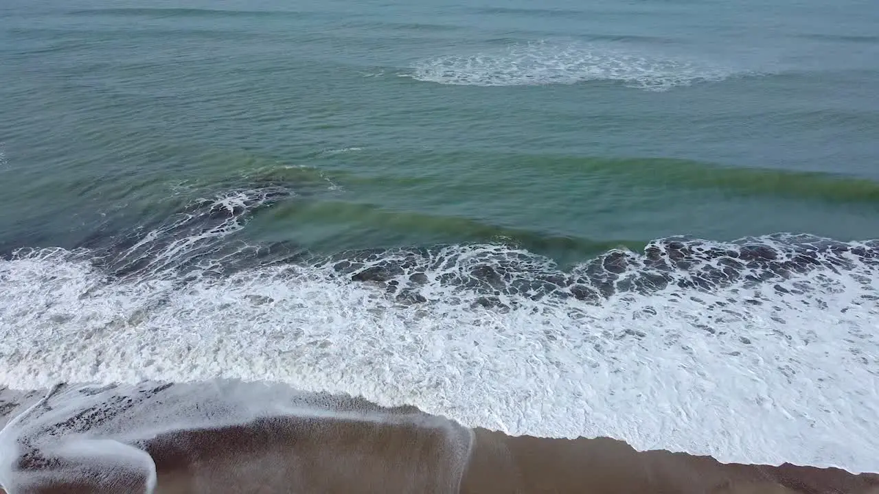 Astonishig view of the Atlantic Ocean with waves breaking on a deserted beach