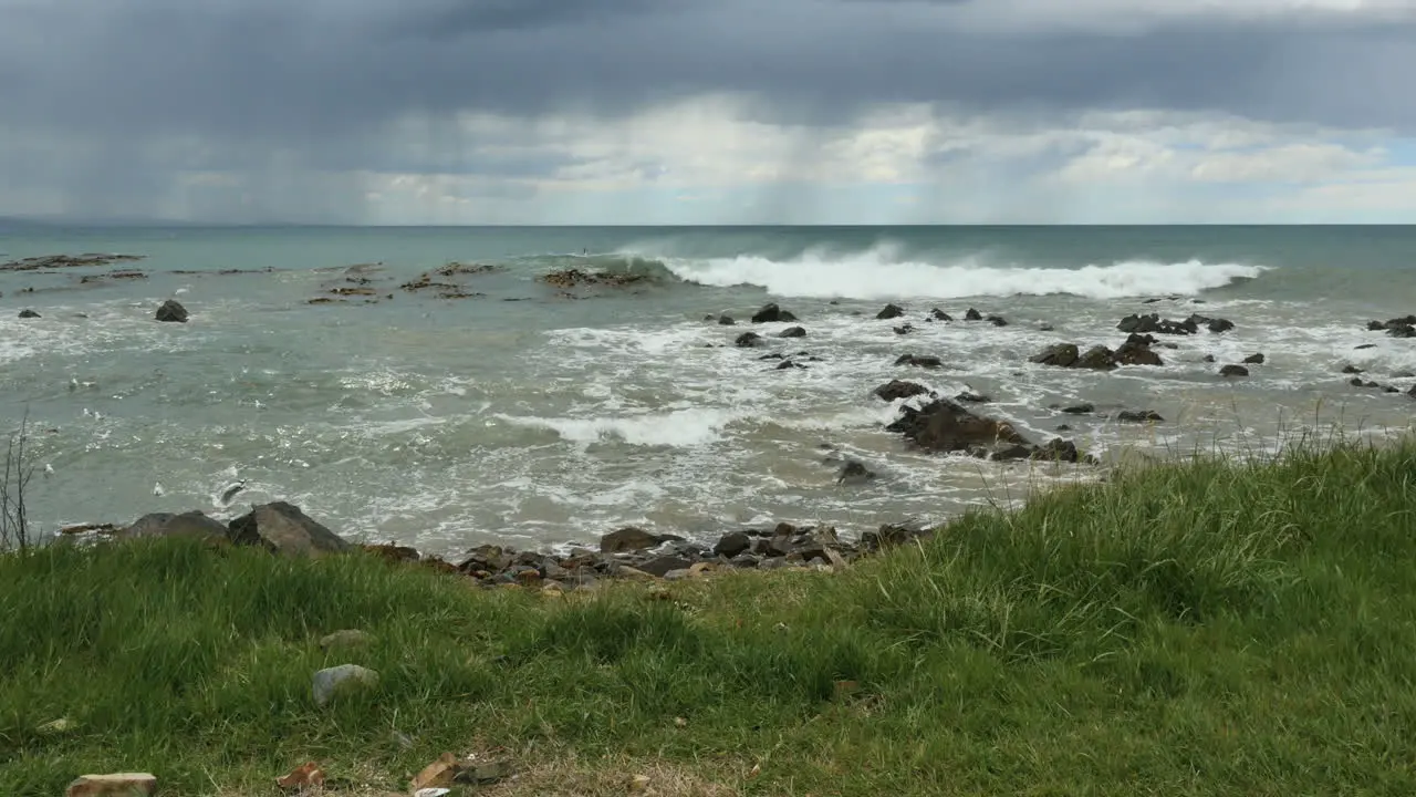 New Zealand Kaka Point Rain Falls Over Sea