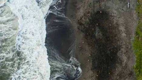 Drone Shot Descending On People Playing Soccer at Pigstone Beach