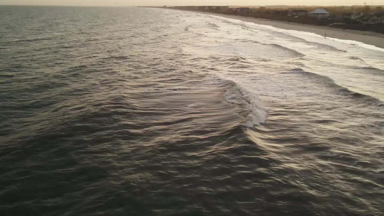 Extreme wide shot of beach sunset over the ocean