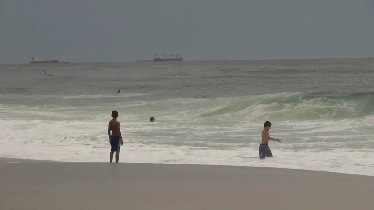 Rio de Janeiro Ipanema Beach boys and big waves