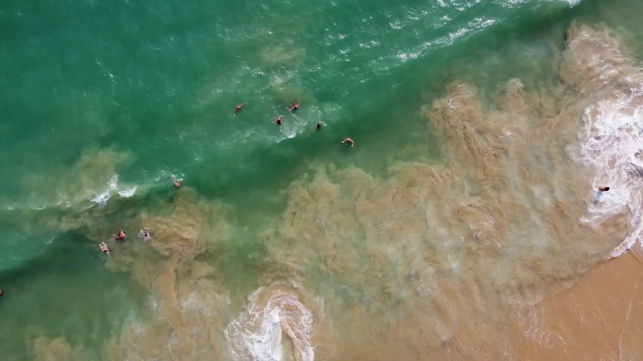 Perfect Birds Eye Shot Of Long Wave Coming Slowly Fading On Sandy Beach