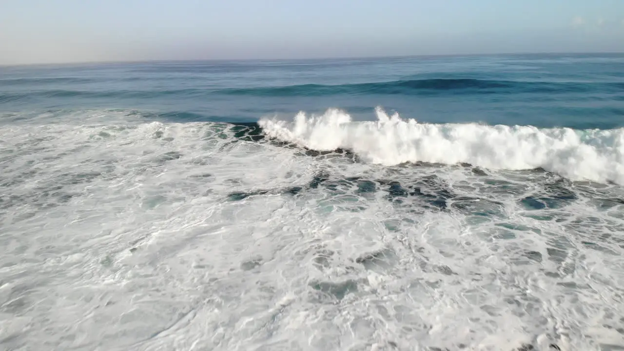 Powerful Ocean Waves On Foamy Surface During Stormy Day