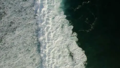 Drone Shot Ascending Above Waves at Uluwatu 