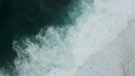 Drone Shot Rotating Above Waves at Uluwatu Coast