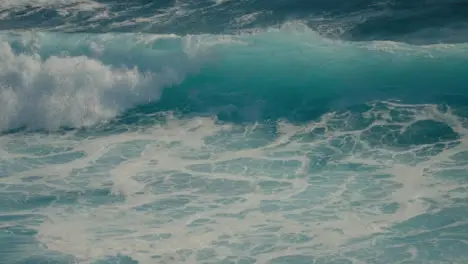 High Angle Shot of Waves Crashing Off the Coast in Bali