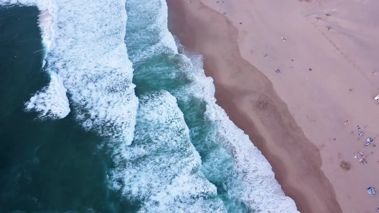 Orbiting Top Down Shot of the Waves at Guincho Beach Portugal