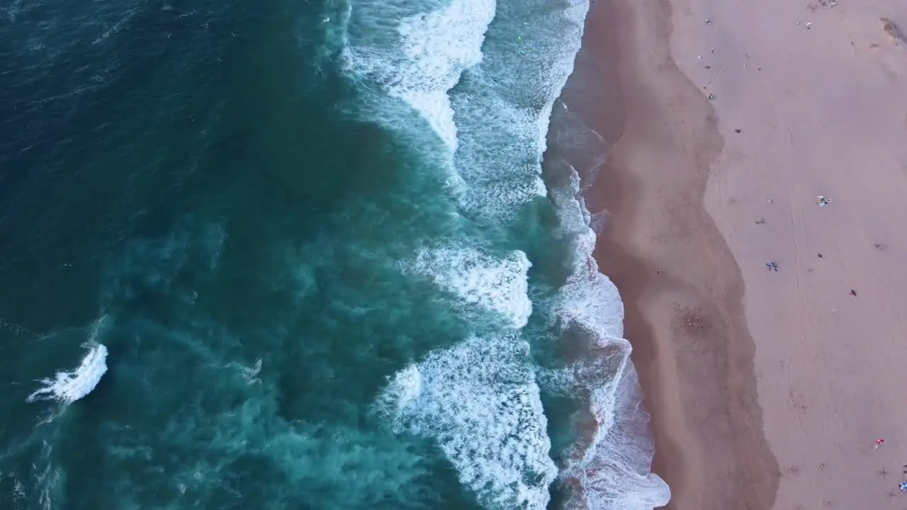 Descending Shot of the Waves at Guincho Beach Portugal