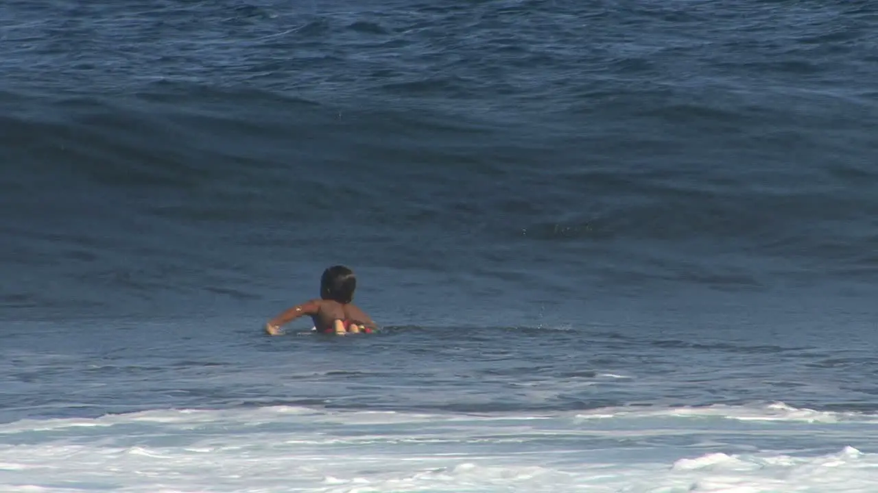 Hawaii Kid challenging waves