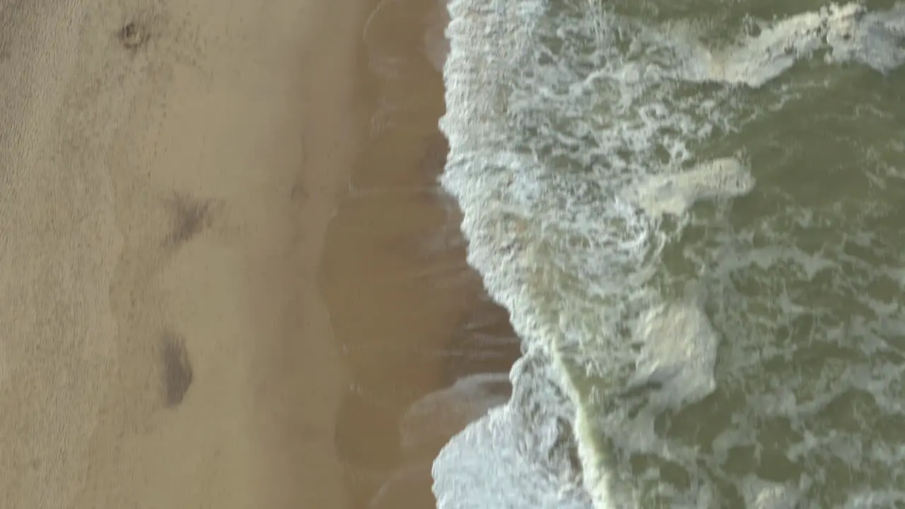 Slow reveal shot of amazing beautiful endless British coast line and the golden sand beaches