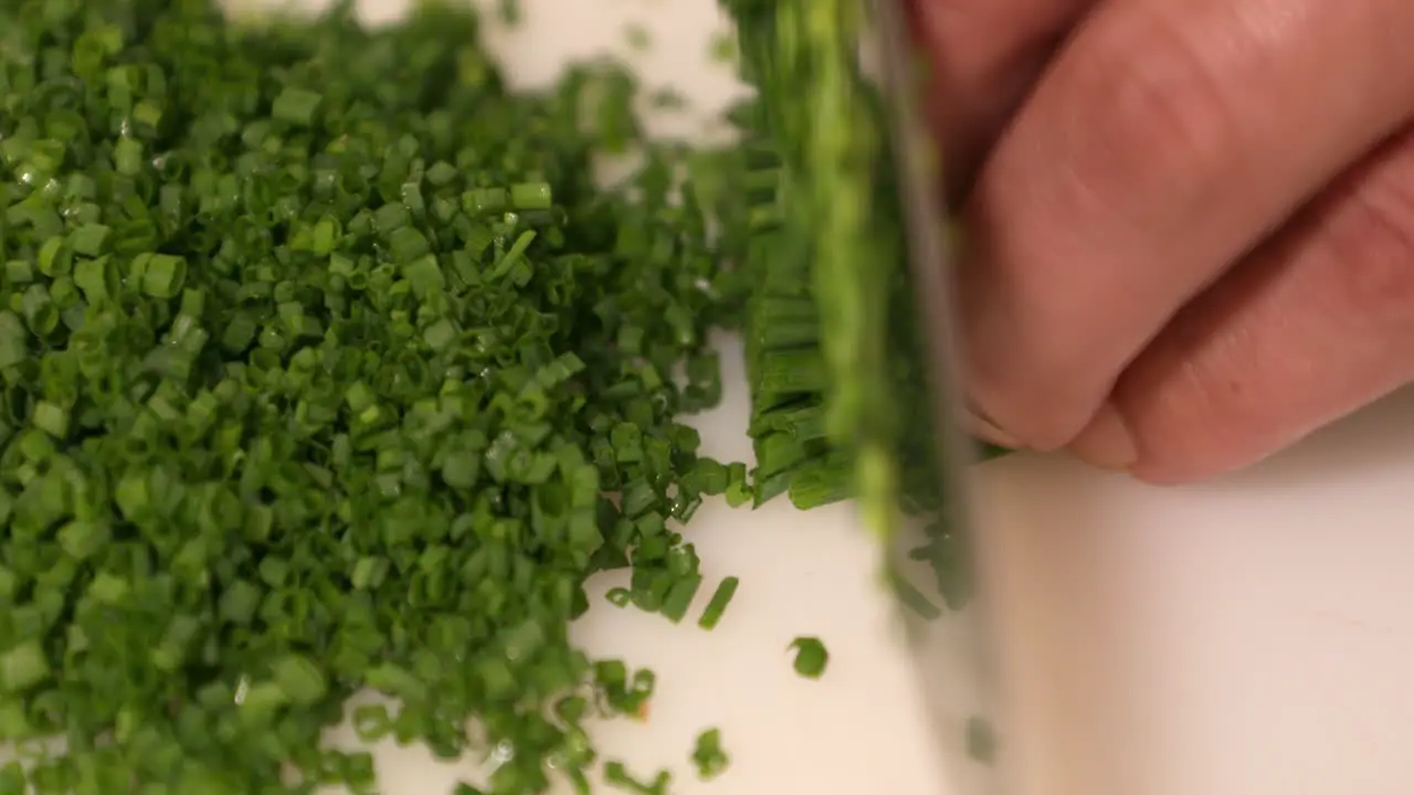 Hands Chopping Fresh Chives In Slow Motion Sushi Ingredients close up