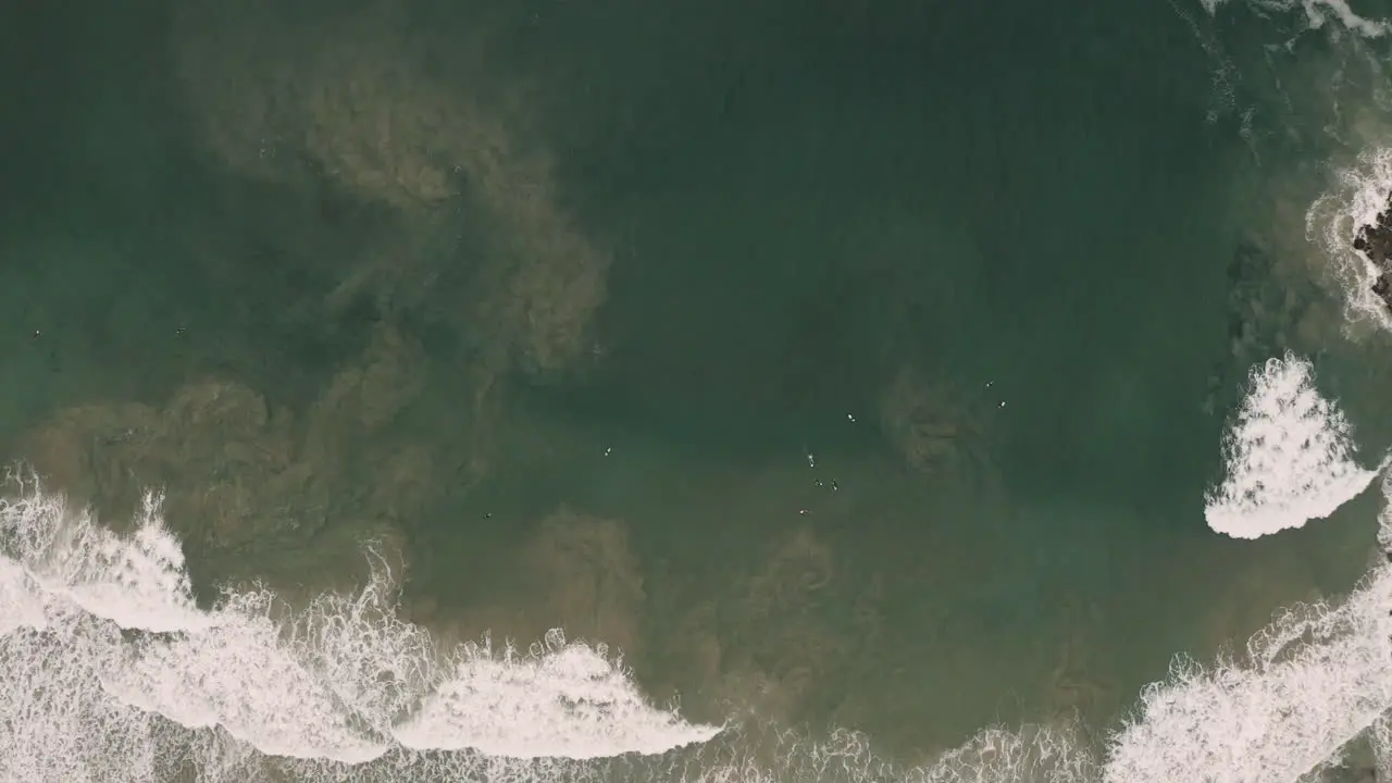 4k Drone top view shot of big ocean waves coming in to the shore at Yamba Australia