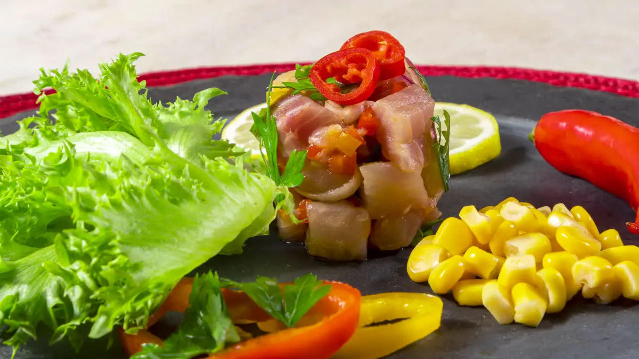 Close-up of delicious ceviche plate on a table