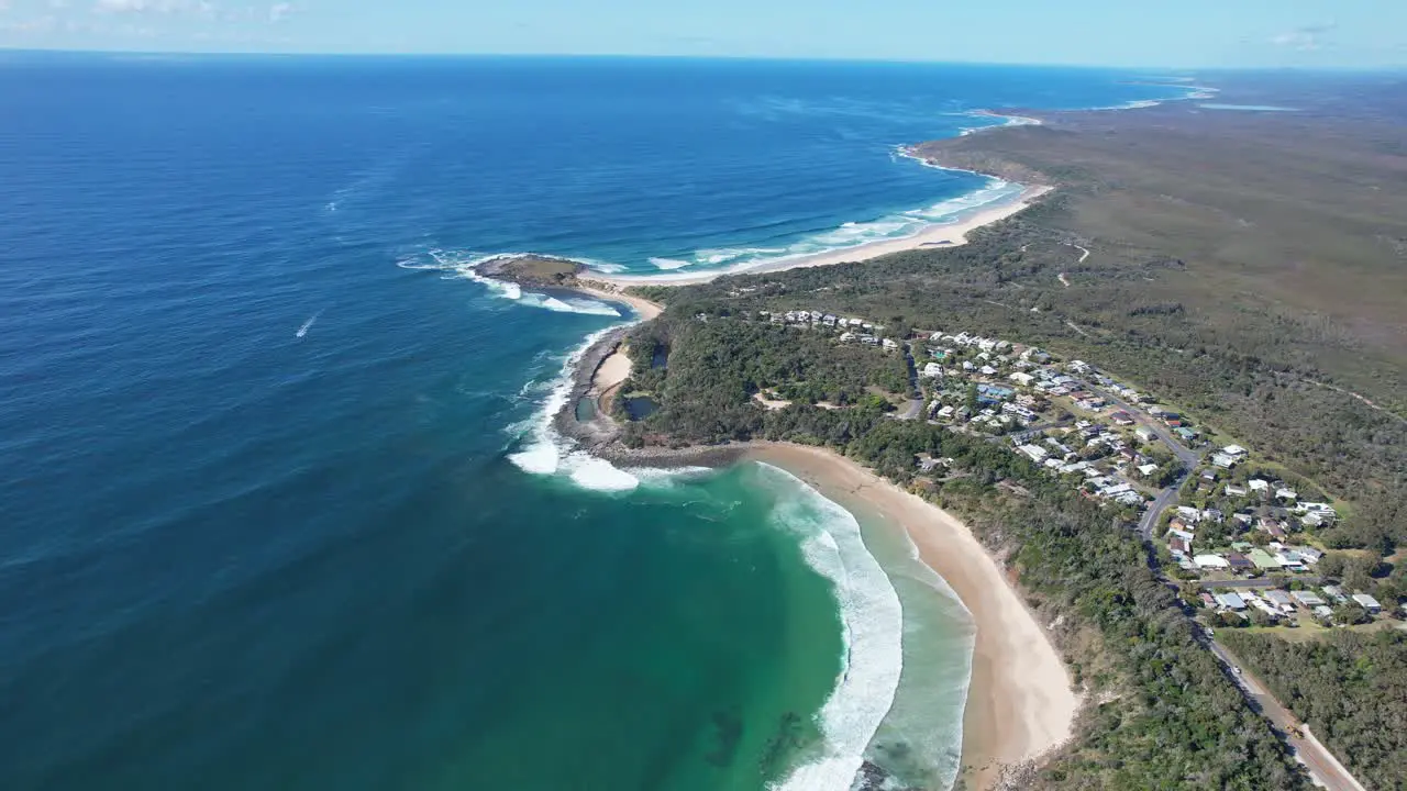 Aerial Pullback Reveal Of Spooky Beach Near Angourie Point Beach In NSW Australia