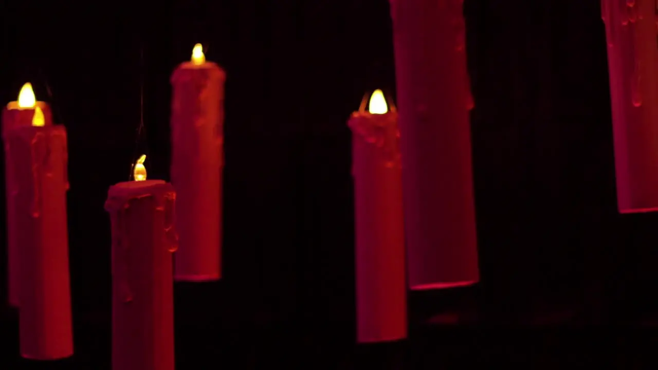 Floating candles with black backdrop